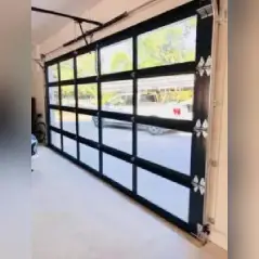 A garage door that is open and has some windows on it.